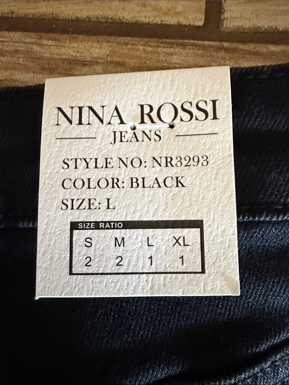 Nina Rossi Black Wide-Leg Jeans with Button Accent - Picture 5 of 5